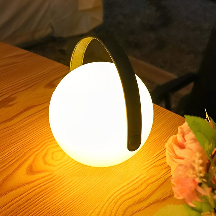 6 Portable RGB Spherical Table Lamp With a Curved Handle
